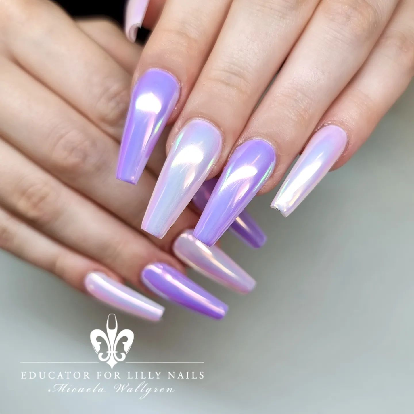 Chrome nails are made to look like the nails of a robot. They are made by painting your nails with a shiny, metallic paint and then adding a layer of clear nail polish over it so it looks shiny. Purple color is a great choice for this type of nails! 