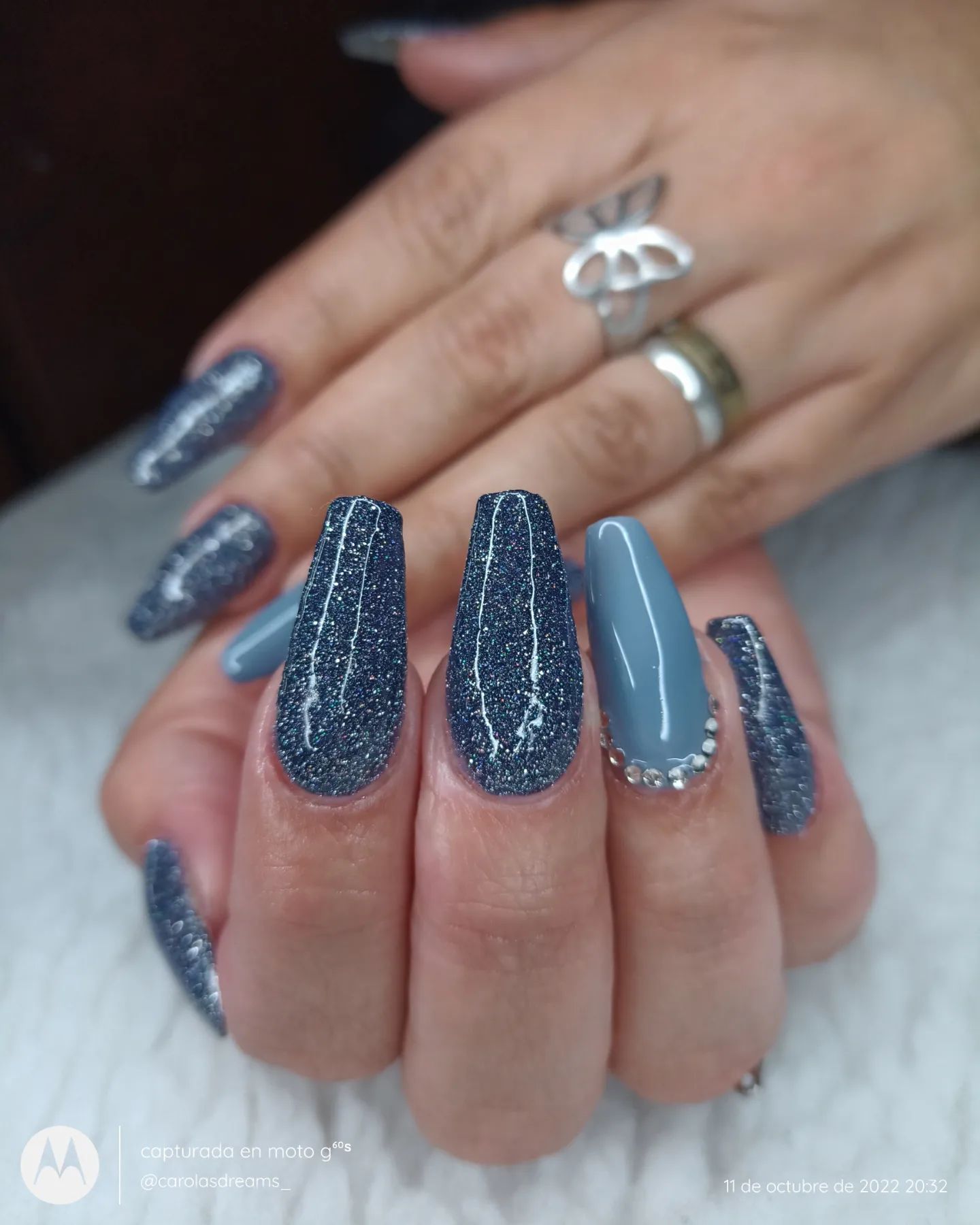 Wanna amaze everyone around you with your nail design? Then, go glossy and shine all the time with your blue nails. The way that blue sparkles against the skin is adorable. It's like you're wearing a light shiny blue dress and it's perfect for any season.