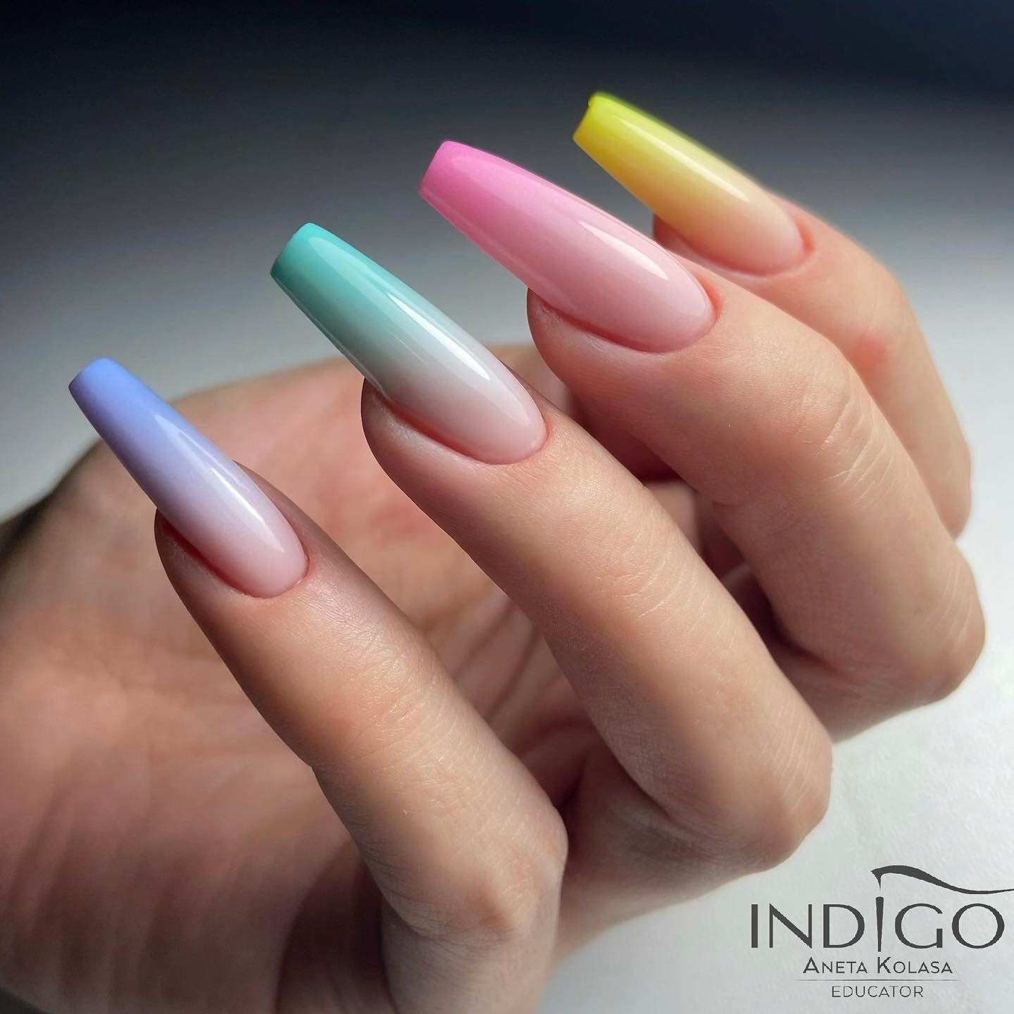 Wanna cheer up your ballerina nails? If your answer is yes, go for an ombre effect! The color change is so subtle, but it looks like you've got a bunch of different shades on your nails. It's a great way to make a statement without going full-on rainbow.