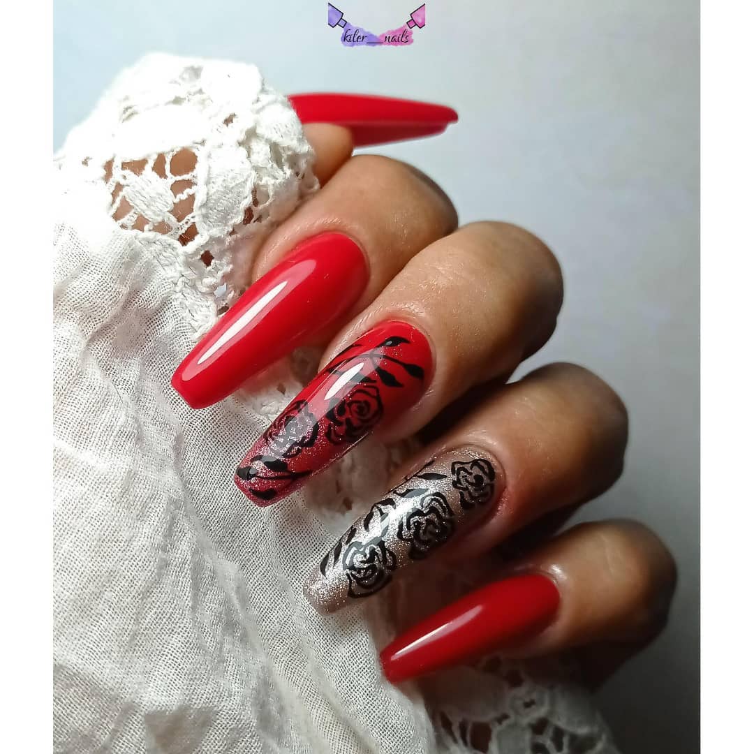 The color contrast between the red and black is fabulous, especially when they are combined with silver glittered accent nail. It's like you're wearing a work of art on your nails because of the rose nail art.