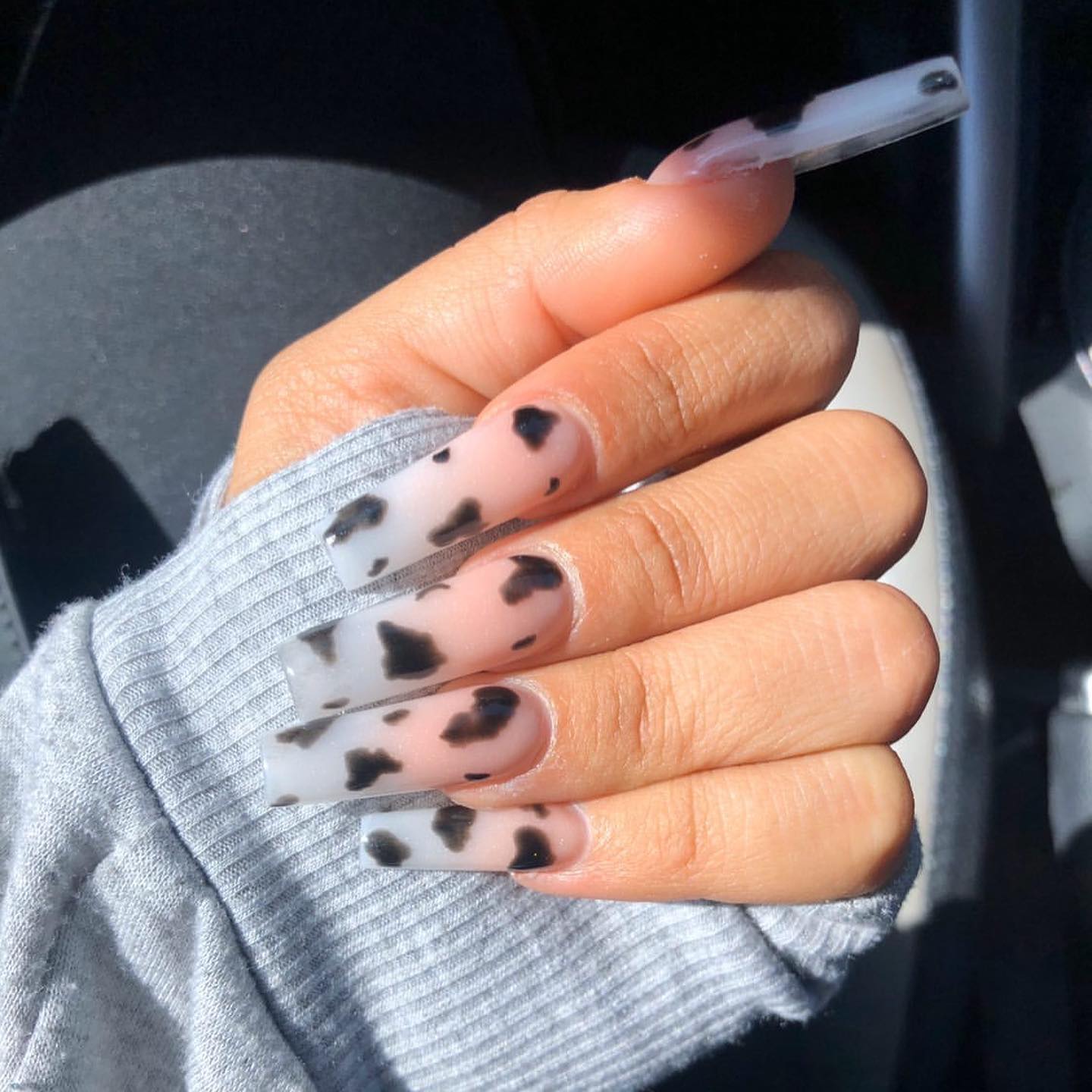 Black and white cow print acrylic nails are a fun and unique way to add some flair to your hands. They're also easy to do, so if you're looking for something fun, these might be a good choice!