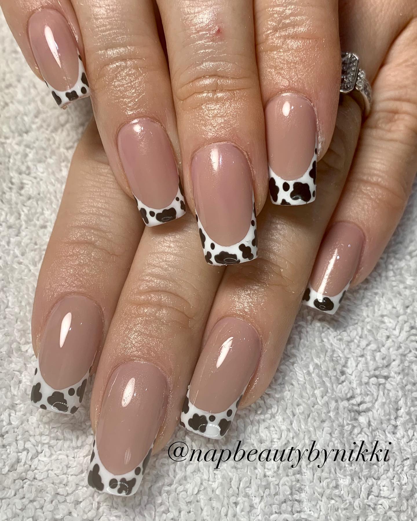 Are you ready for a cow-themed party? Your long square nails with be quite matching with cow print French tips like the one above. Darker tone of nude nail polish will add an extra beauty, too.