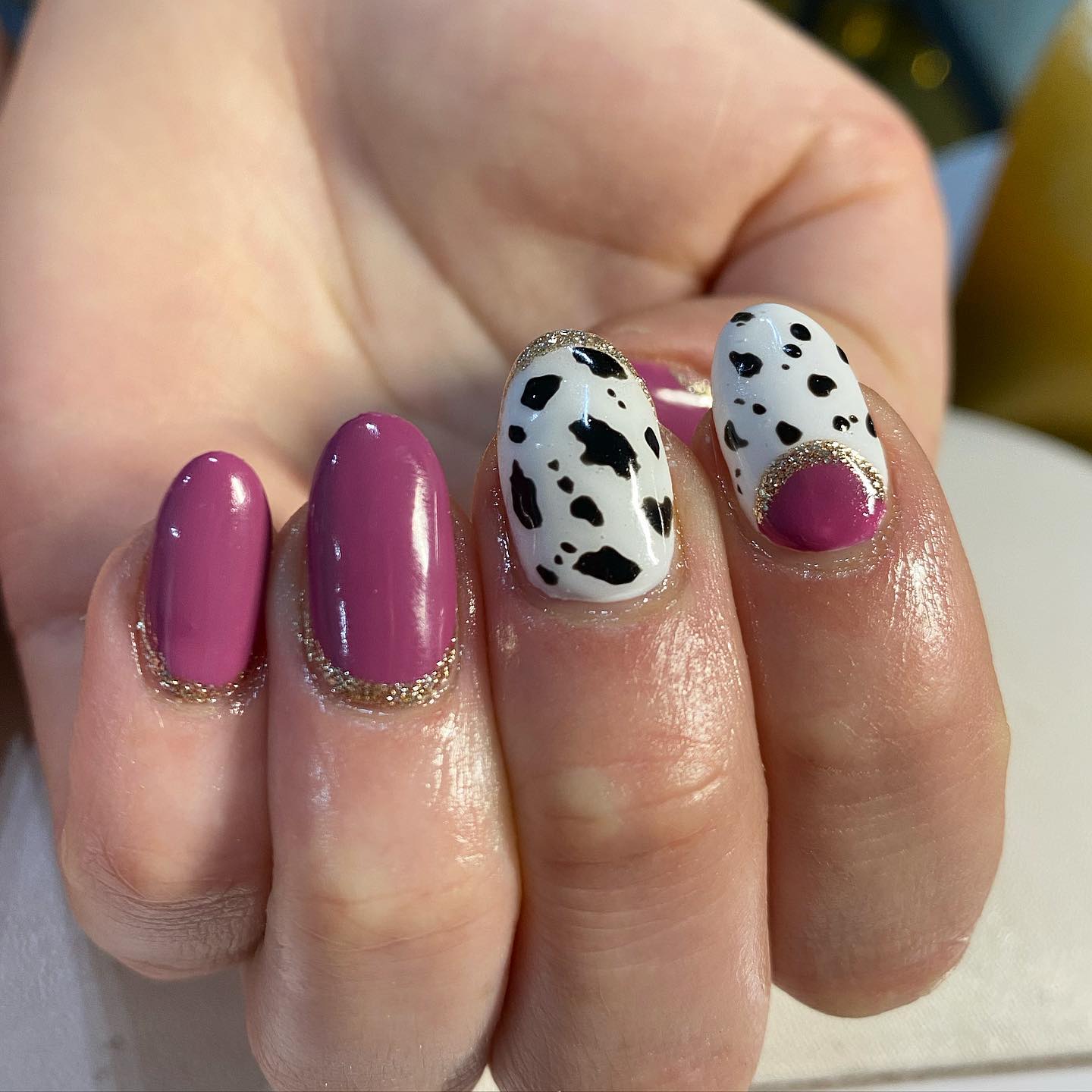 This shade of pink is so adorable! Apply cow prints to your accent nails and add some shiny glitters on them. The combination of pink and cow print is quite tasteful and it creates a great balance between edgy and elegant!