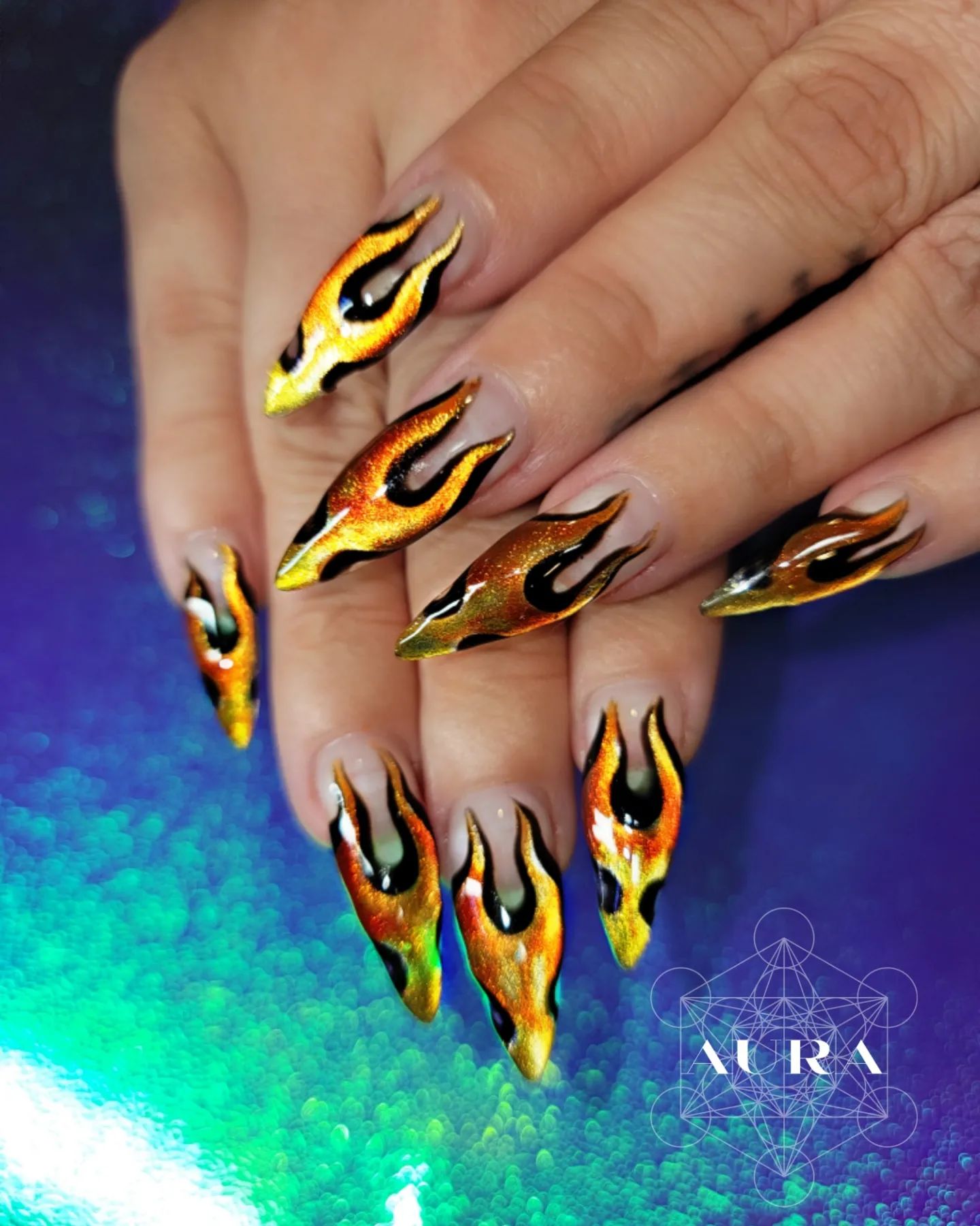 Aren't these nails are super fabulous? Playing with lighting looks super fun both for the nail artist and the one who gets this nail art. Everyone around you will want to check your nails closely.