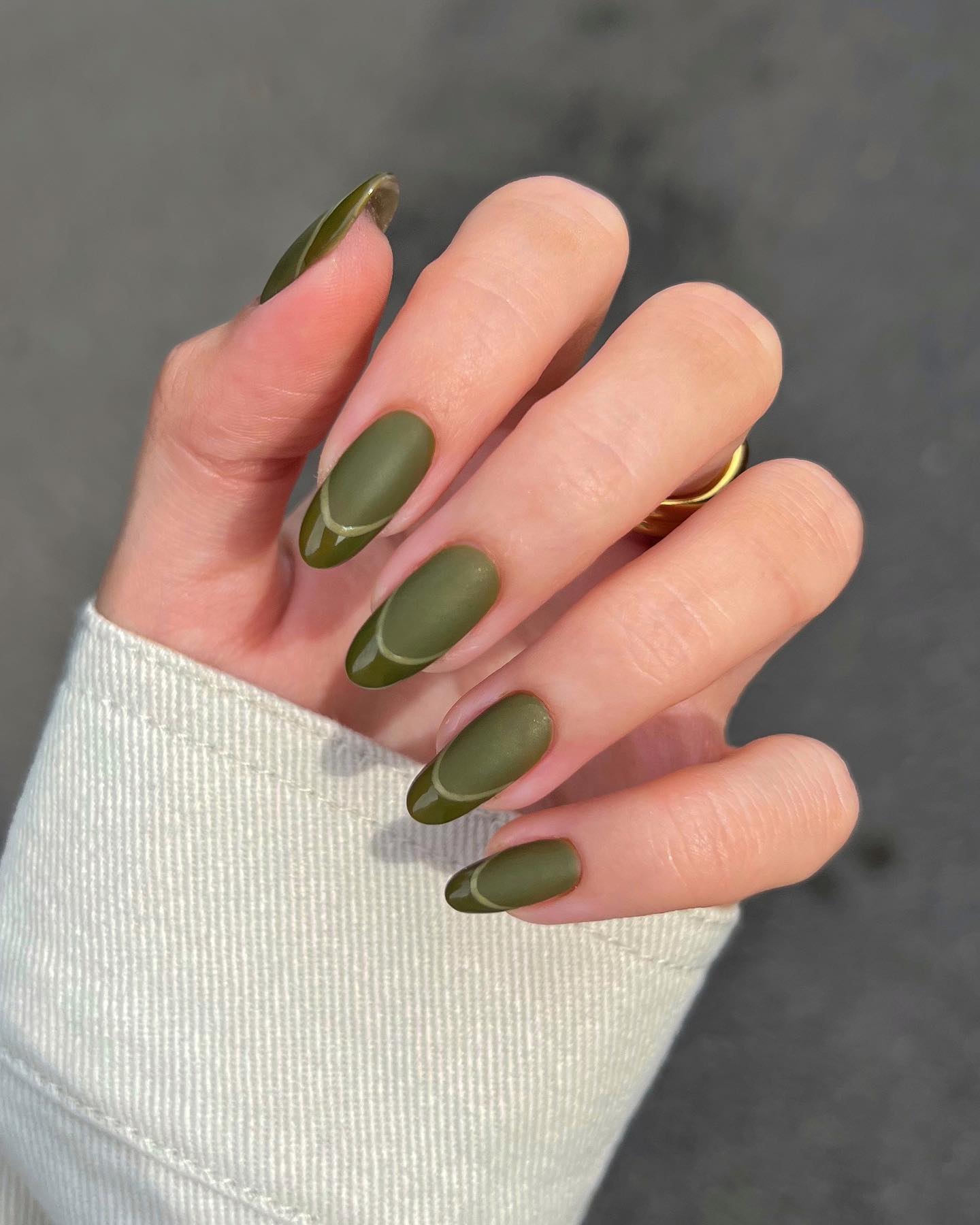 Shiny and matte nail polishes are equally amazing. And you know what? You can combine them together so that you don't have to choose one. For your khaki matte nails, apply a French mani with shiny version of this color on tips. 