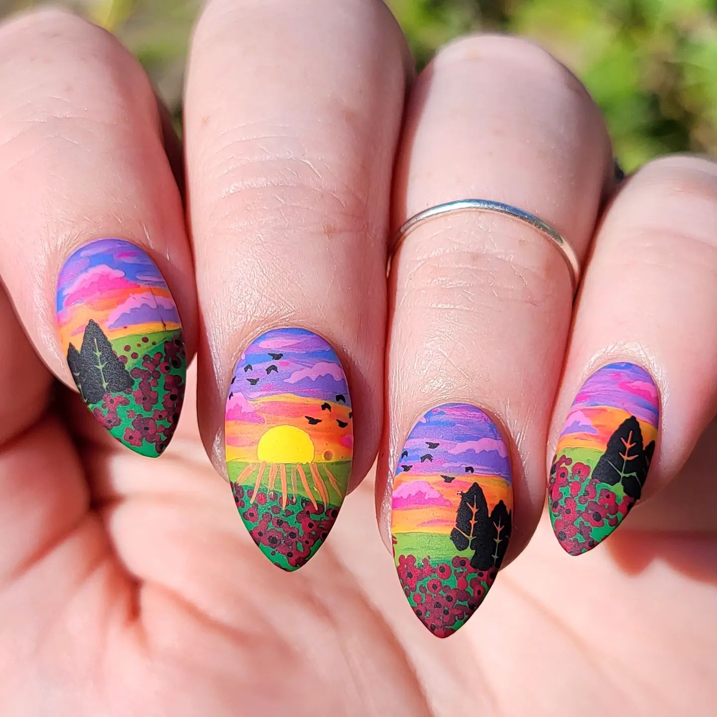 At the end of each day, sunsets remind us to rest and watch the beauty of the sky. Being one of the most beautiful views, sunsets inspire many designs just like nail designs. Just look at the harmony of various colors above. This matte look is definitely an art piece.