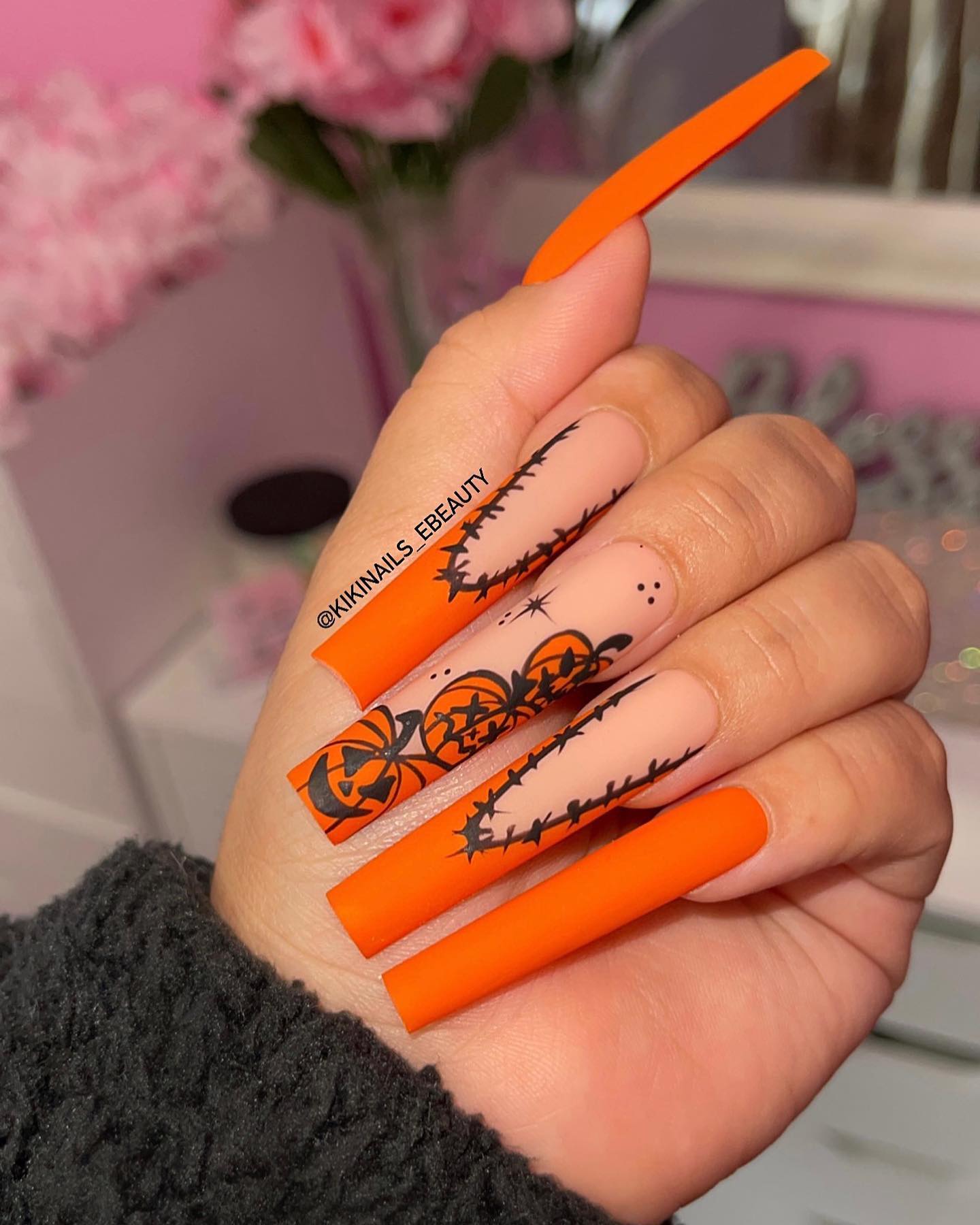 Long acrylic nails are always there to amaze everyone you come across but you know... There is always something more to add. Go for a bright orange matte nail polish and draw barbed wires and pumpkins if you want to be ready for Halloween to the fullest.