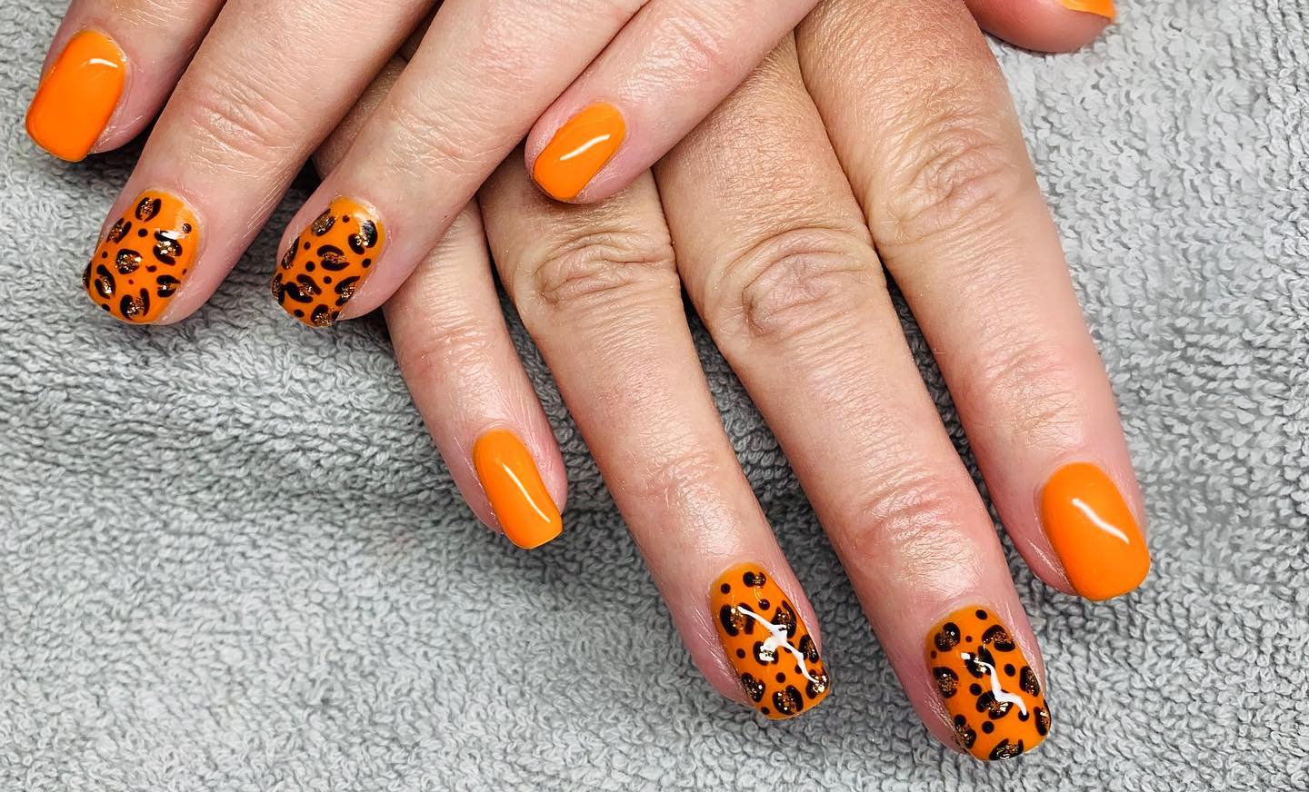 Orange leopard print nail design is a beautiful way to add some fun to your look. It's a great way to show off your love for the animal world, and it can be worn with a variety of outfits.
