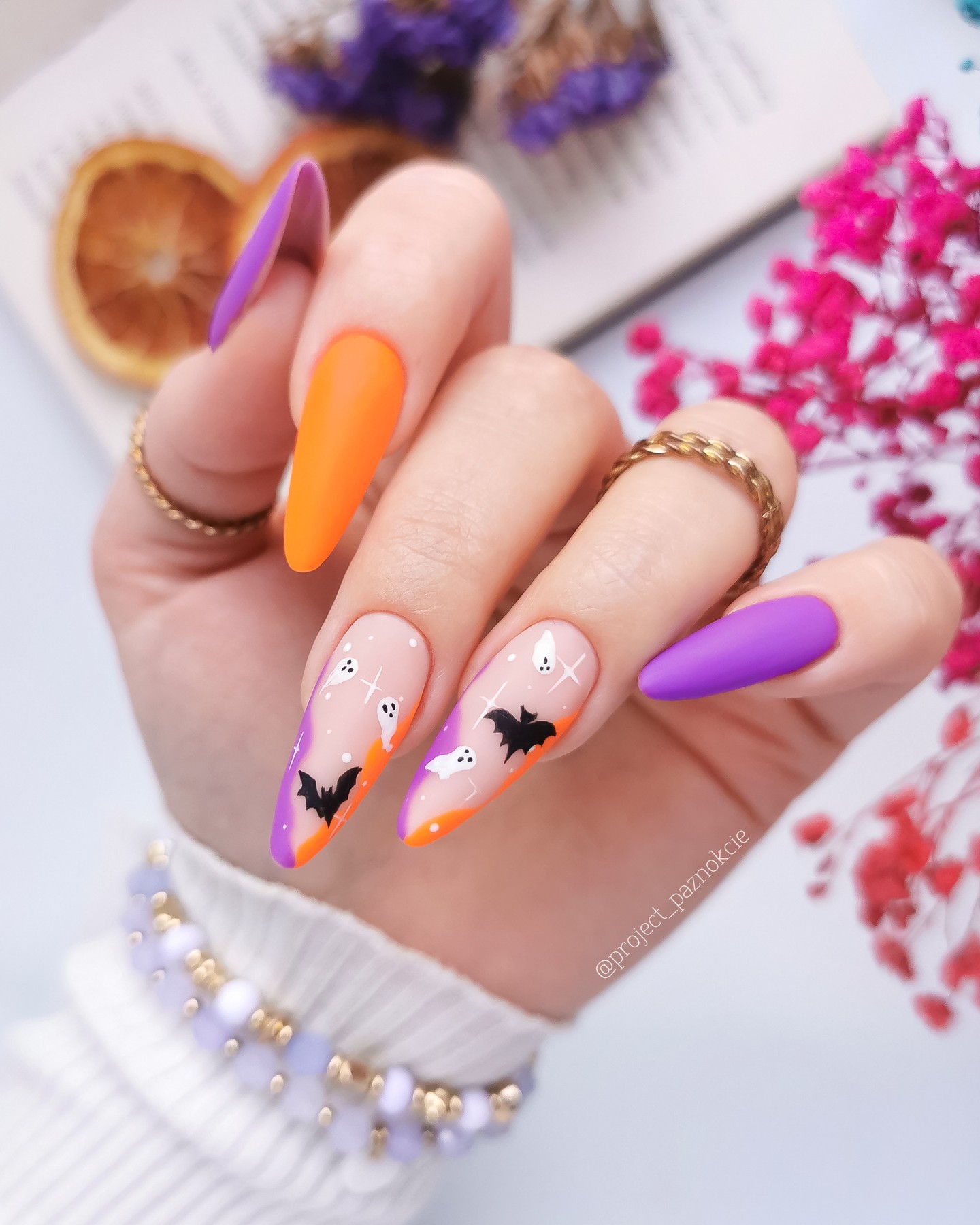 It is a lot of fun to use orange and purple in the same palette. The colors are similar enough that they can be combined, but different enough that they will still look new and fresh. To give this nail design a scary look, add some bats and ghosts on accent nails.