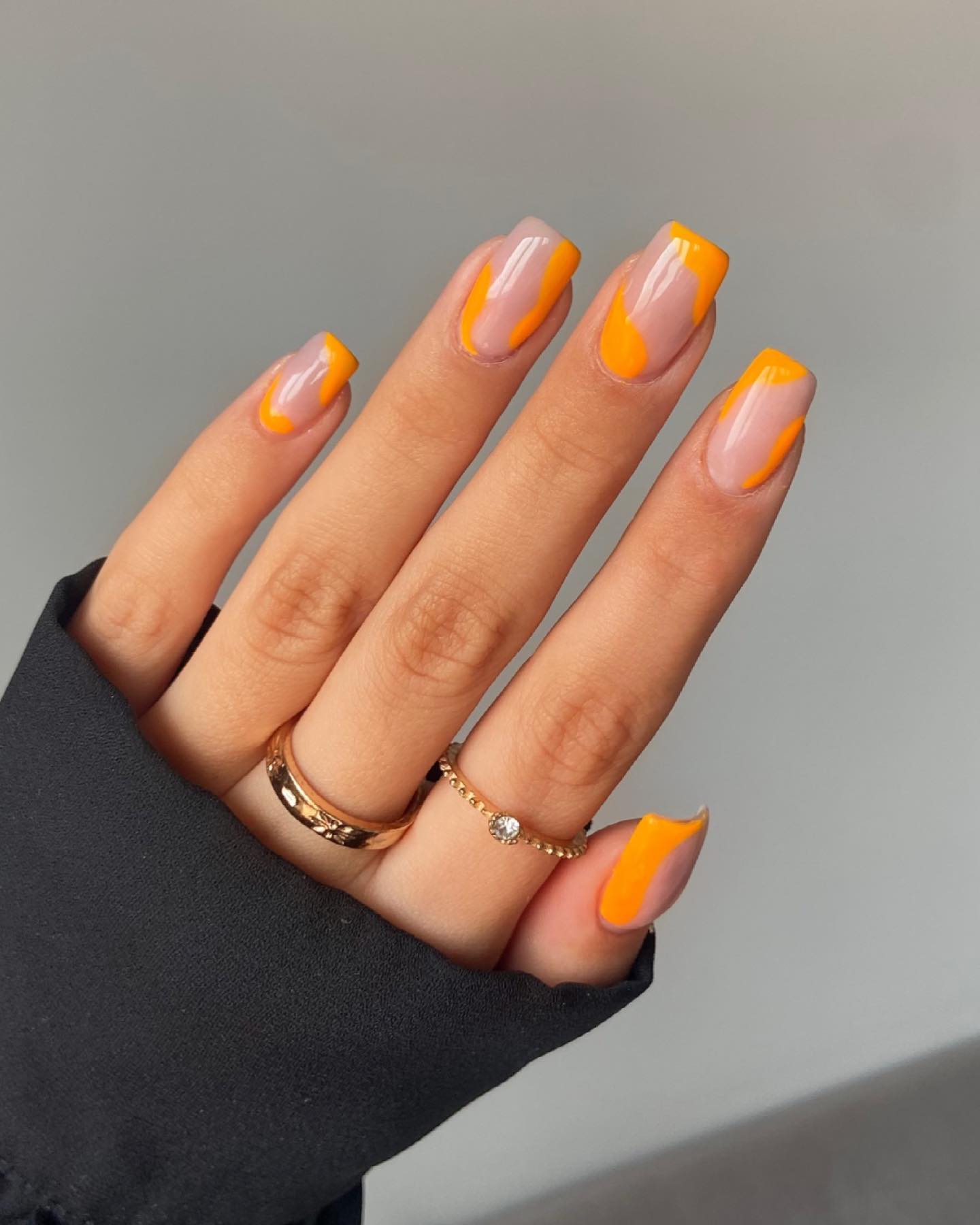 Orange swirl nail art is actually a thing! It's a really fun look that can be done with a lot of different shades of orange, and it's a great way to add some excitement to your nails. Like the one above, you will be ready to rock.