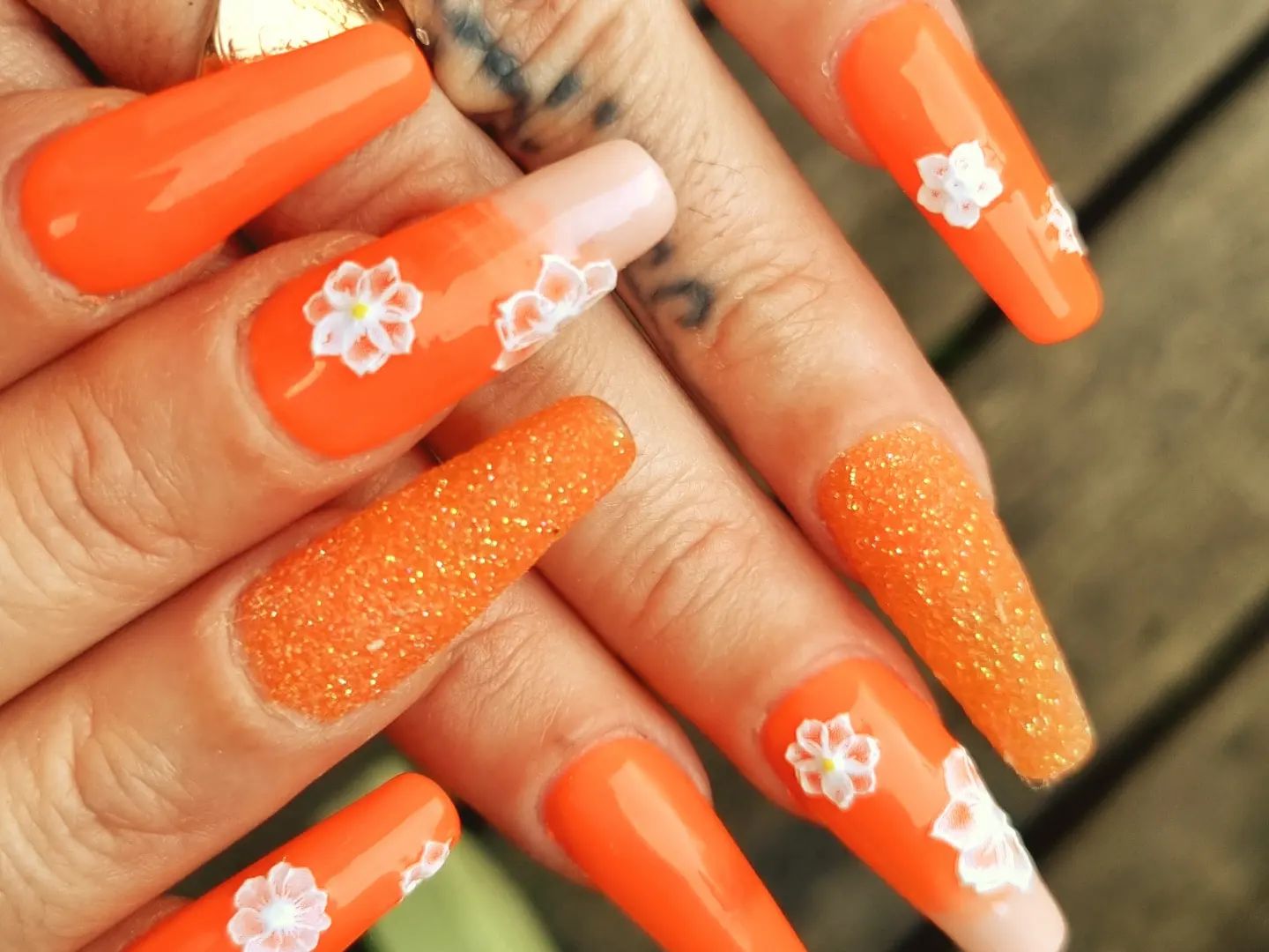 Orange is perfect for the summertime, especially if you're going on vacation because it'll help you feel like you're in the tropics without having to actually go there. Plus, if you decorate it with glitters and flowers, it will be more awesome!