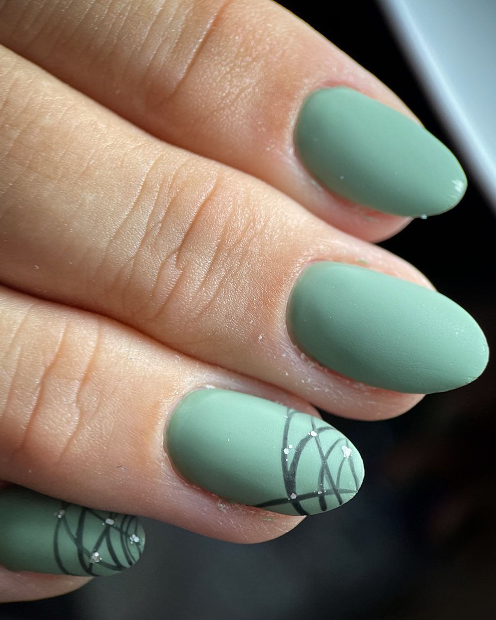 Jade green matte nail is a very unique color. It's not quite as dark as olive green and it's not as light as sage, so it's kind of in between. When you apply this color to your oval shape nails, you will look beautiful for sure.