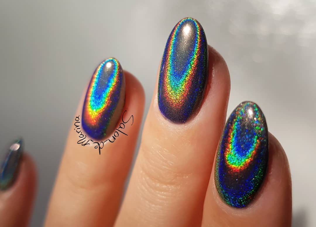 Holographic nails are a great way to add some extra flair to your oval manicure. If you're looking for something that's a little less traditional, but still wants to feel like it fits in with the rest of your look, this is a great way to do it!