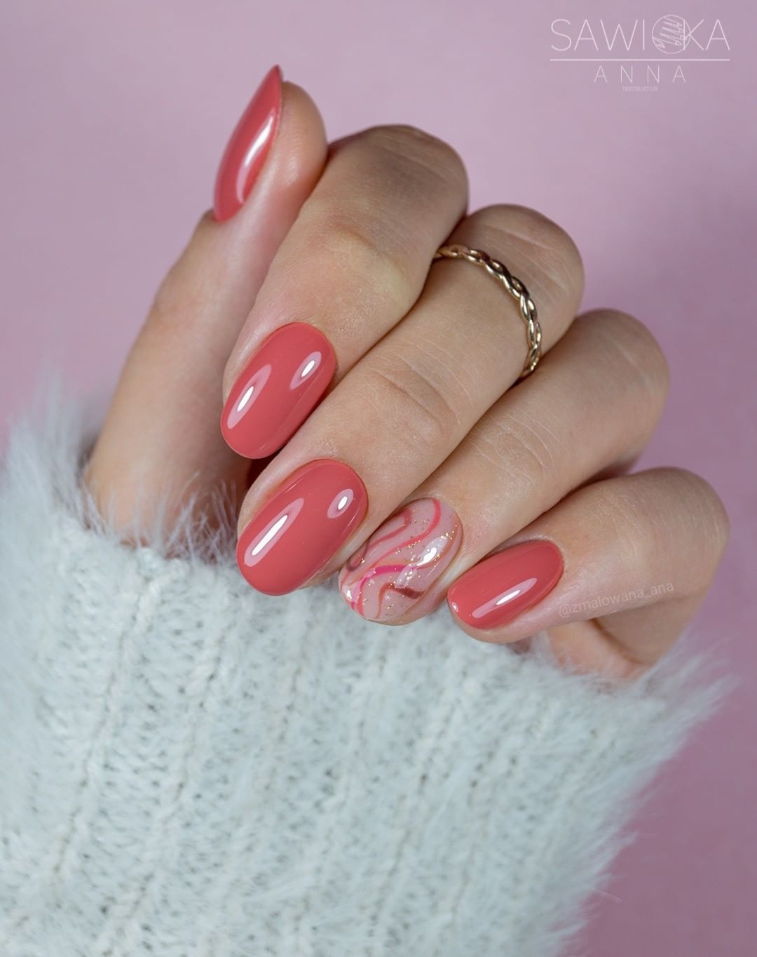 This pale shade of orange is perfect especially for winter. If you think that the color of the nail polish is too pale for you, you can have an accent nail which is full of swirls and glitters.