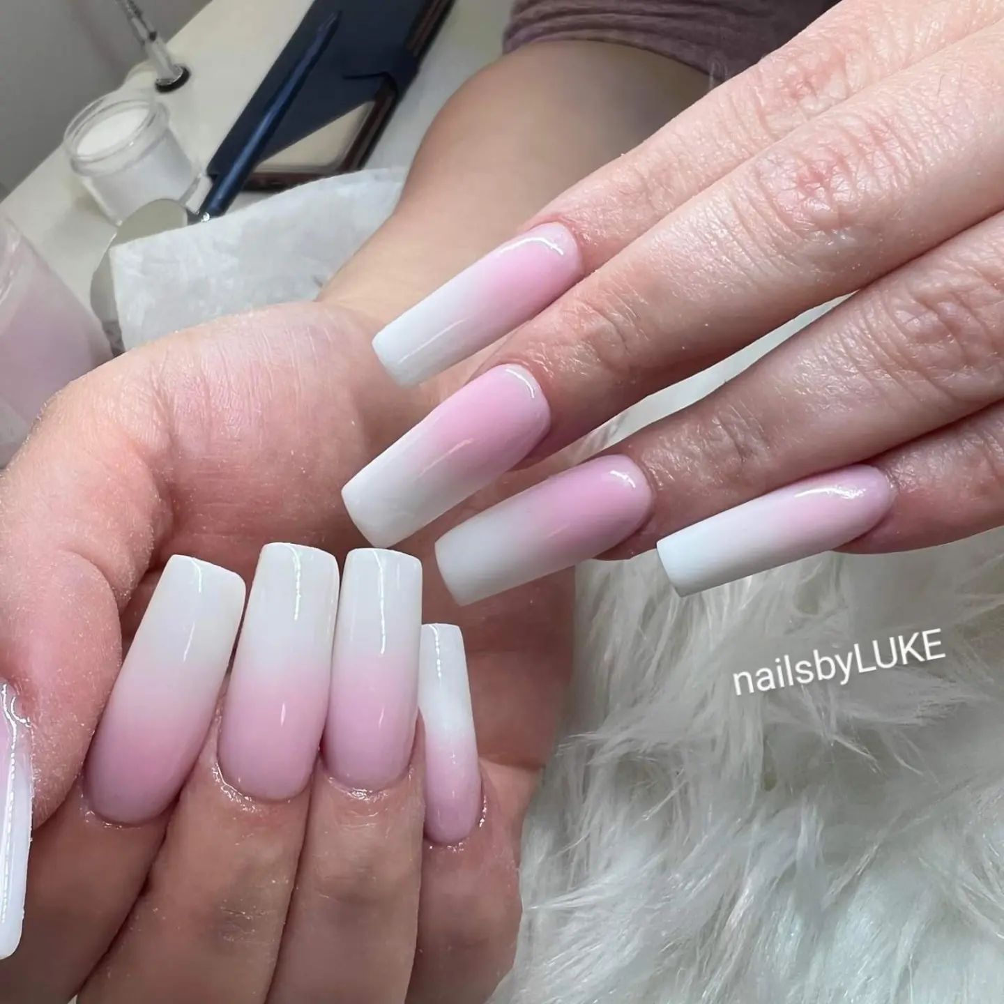 If you do not care about your comfort a lot and you can do everything to look stunning, why don't you give a shot to these white and pink ombre nails? You are sure to rock with them.