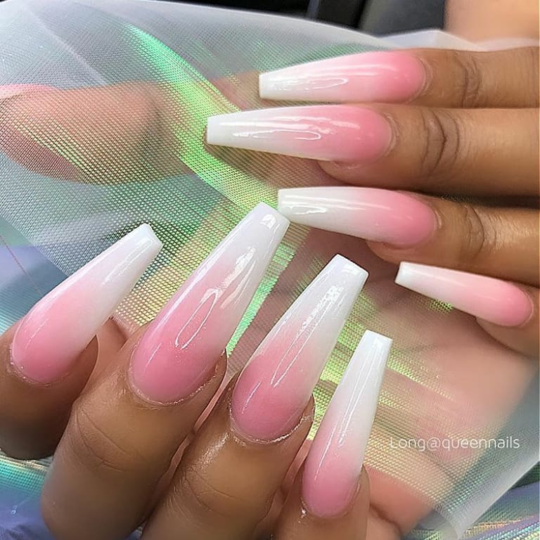Defined by tapered sides and a straight tip, ballerina nails are favored by many stylish women. They help you make a statement, so let's make this statement stronger with pink and white ombre nails.