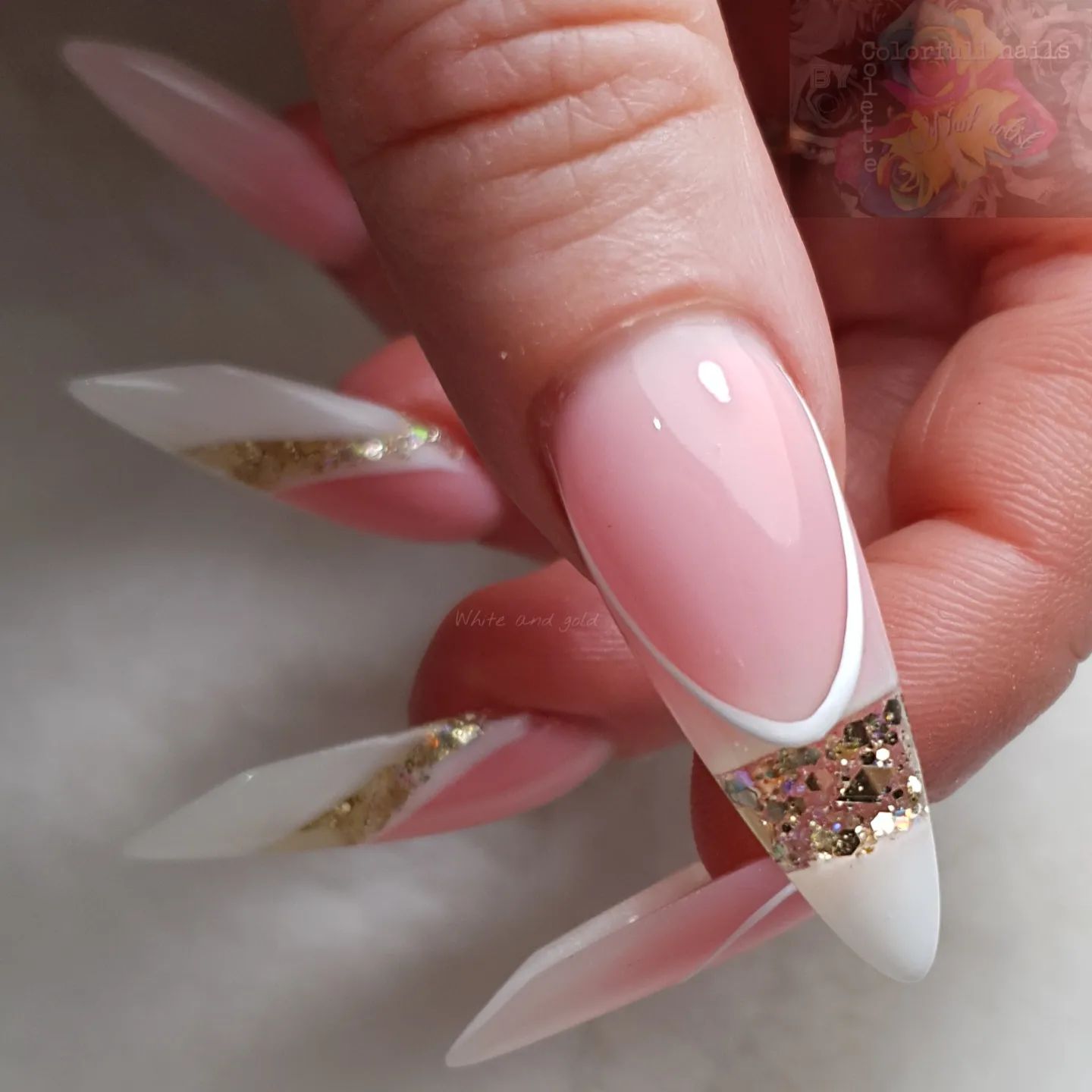 If you can't take your eyes off this unique nail design, you are right to do that. It's just not a nail design but it's an artwork, for sure. Designed as a French mani, these pink and white ombre nails were taken to a different level with the detail in the tips since the shiny line offers a fantastic look.