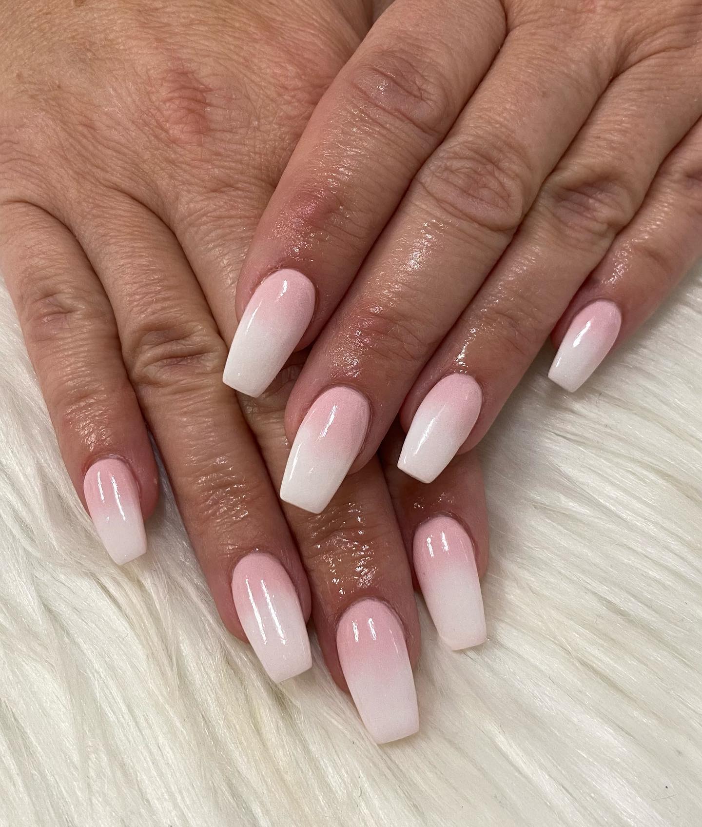 Basic and simple nail designs are always a favorite since you know that they won't make you upset in the end. If you are fond of these, go for this simple pink and white ombre nail design. 