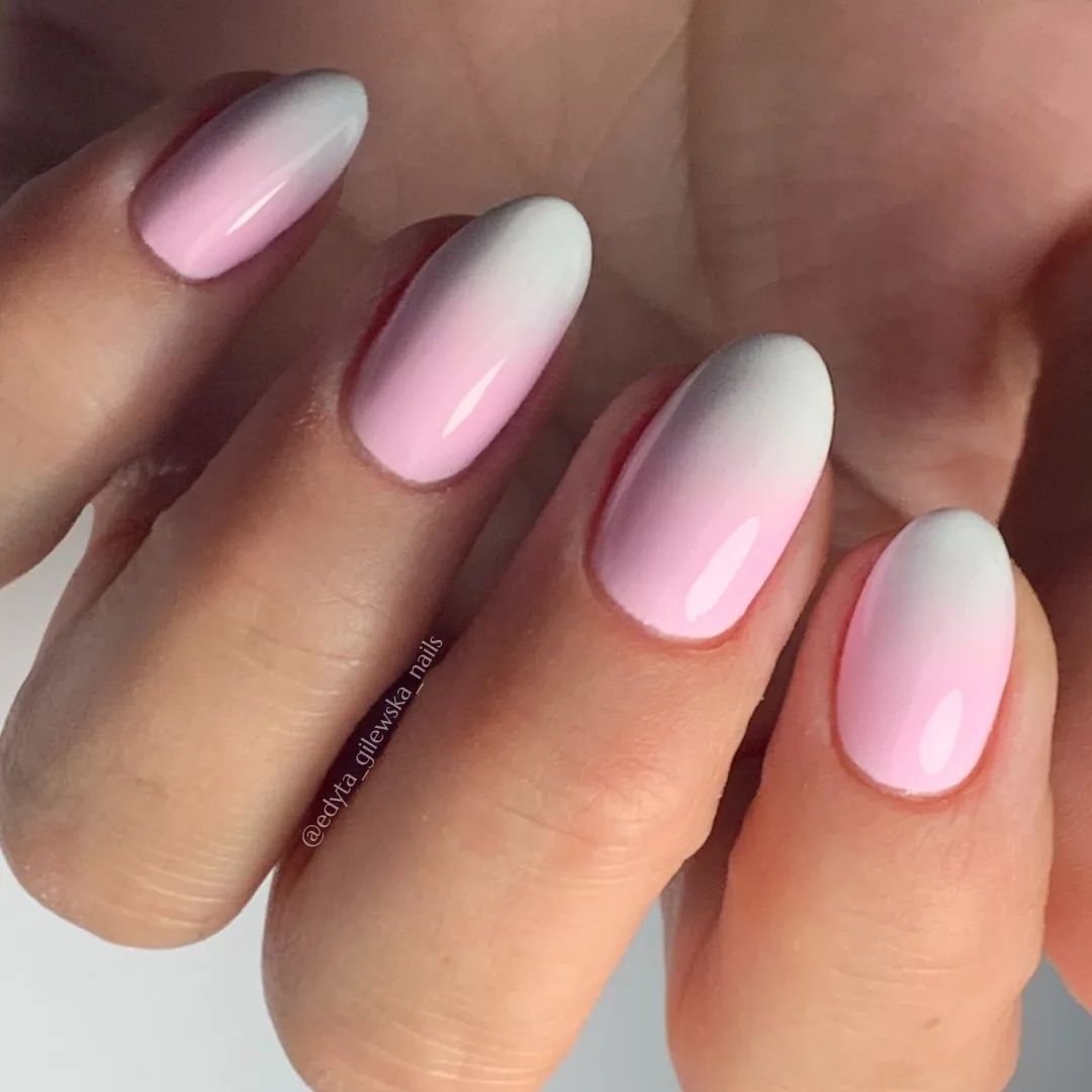 Baby pink is a shade of pink that is a super-cute and princess-like. Let's match this color with a bold white color to add the pink an extra beauty. Almond nails look very suitable for this ombre.