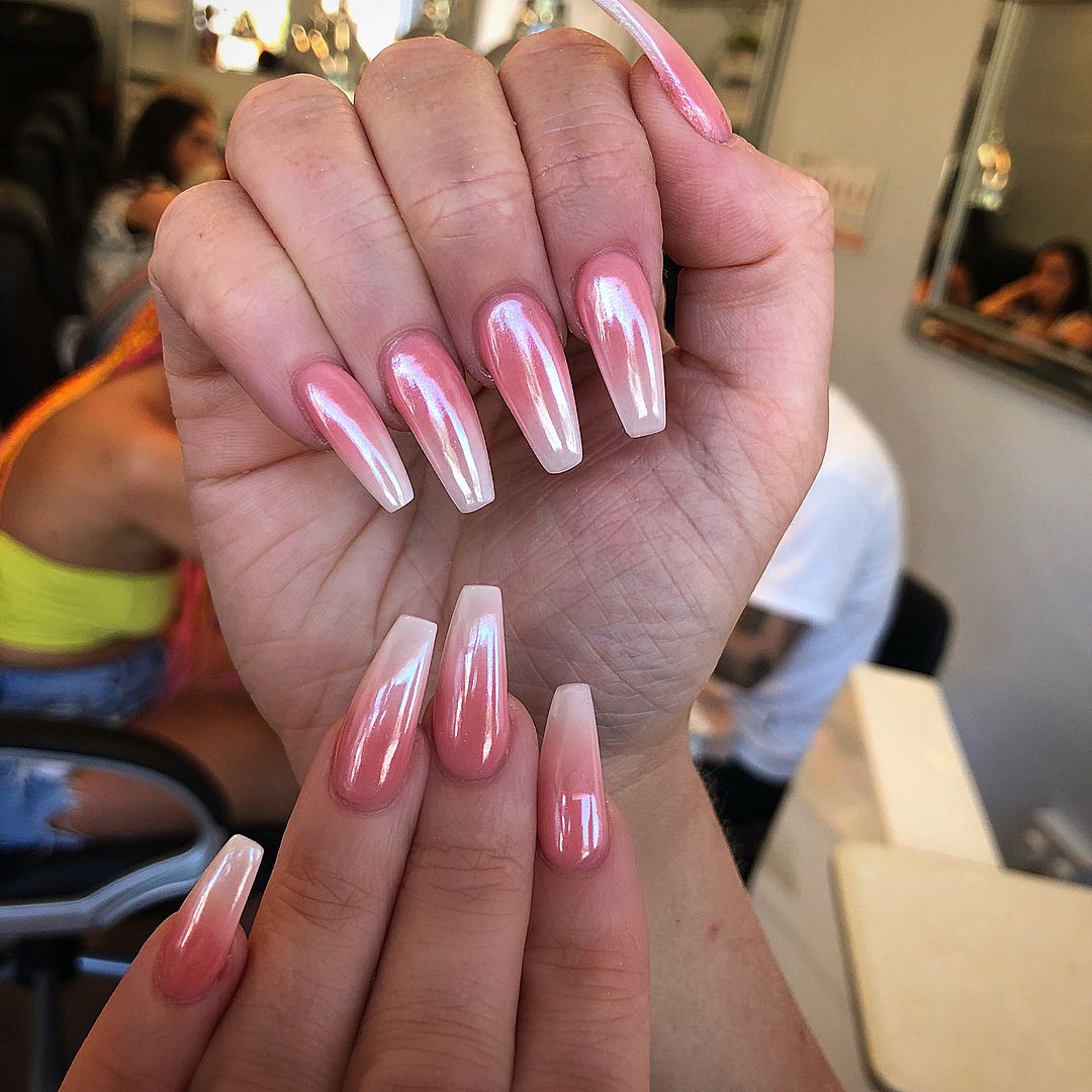 Chrome nails have a become so popular that we began to see lots of examples of it. As a creative idea, why don't you mix chrome with pink and white ombre nail design? This light effect will satisfy you every time you check your nails.