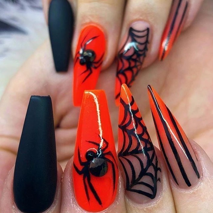 This shiny reddish nail polish is taken to a different level with matte black. Spiders and their webs are mostly associated with Halloween, so we can say that this nail design is great for it.