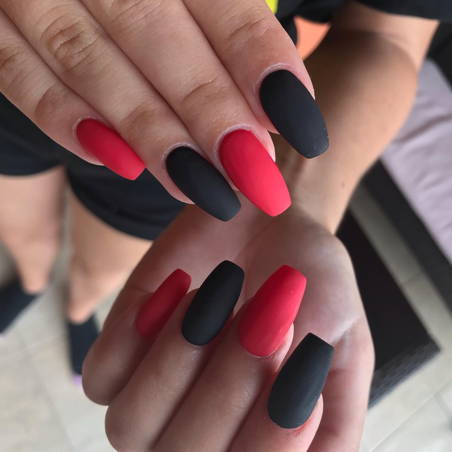 Even though glossy nail polishes are always a favourite choice, cool matte designs will never go out the style. Half red and half black matte nails look super classy and you do not need any other decoration.