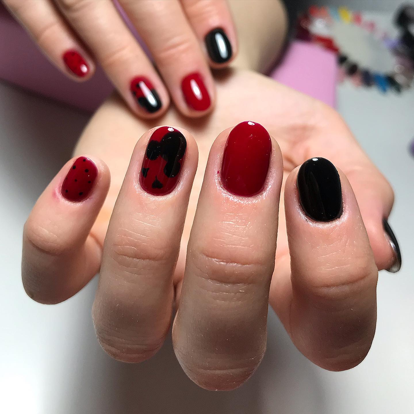We see Mickey designs everywhere, so why not using them as a nail art? If you want to have a Mickey with you on your nail, black and red nail colors are perfect for you. Let's give it a shot.