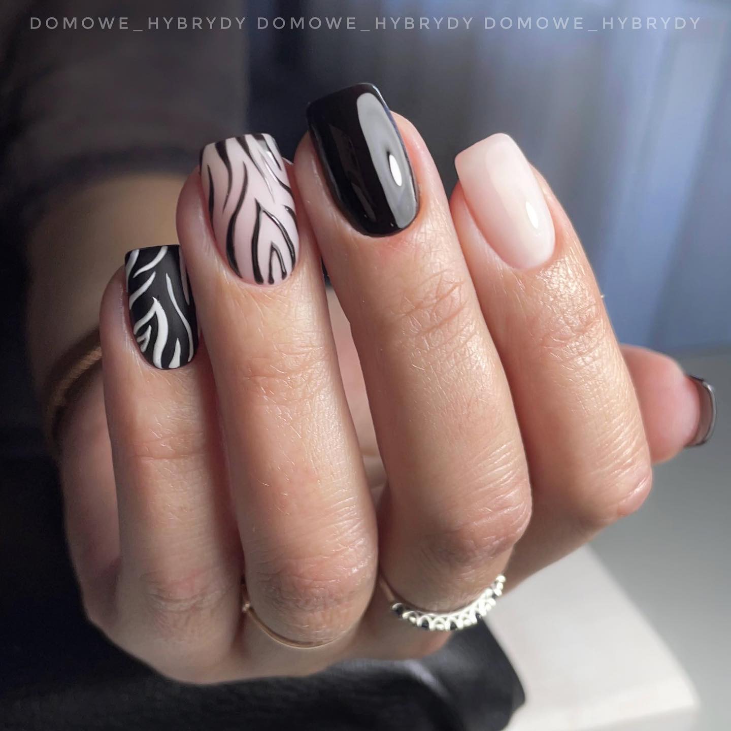 Zebra nail art is a design that uses black and white stripes to create a zebra-like pattern on the nails. Your short nails will be taken to a different level with zebra accent nails.