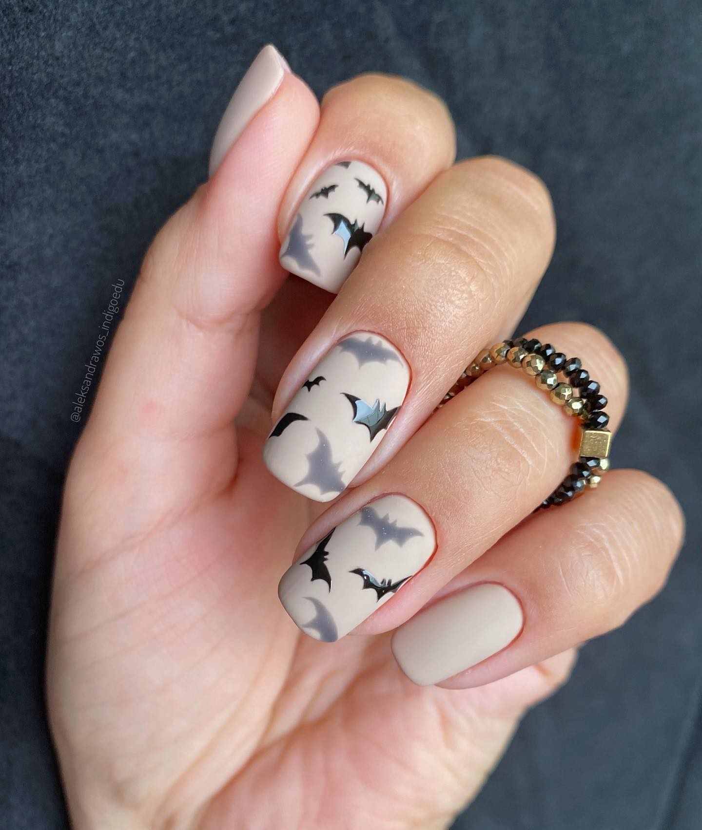 Bat nails are a great way to add a little something extra to your manicure. They can be done in a number of different ways, from just painting bat wings on nude matte manicure.