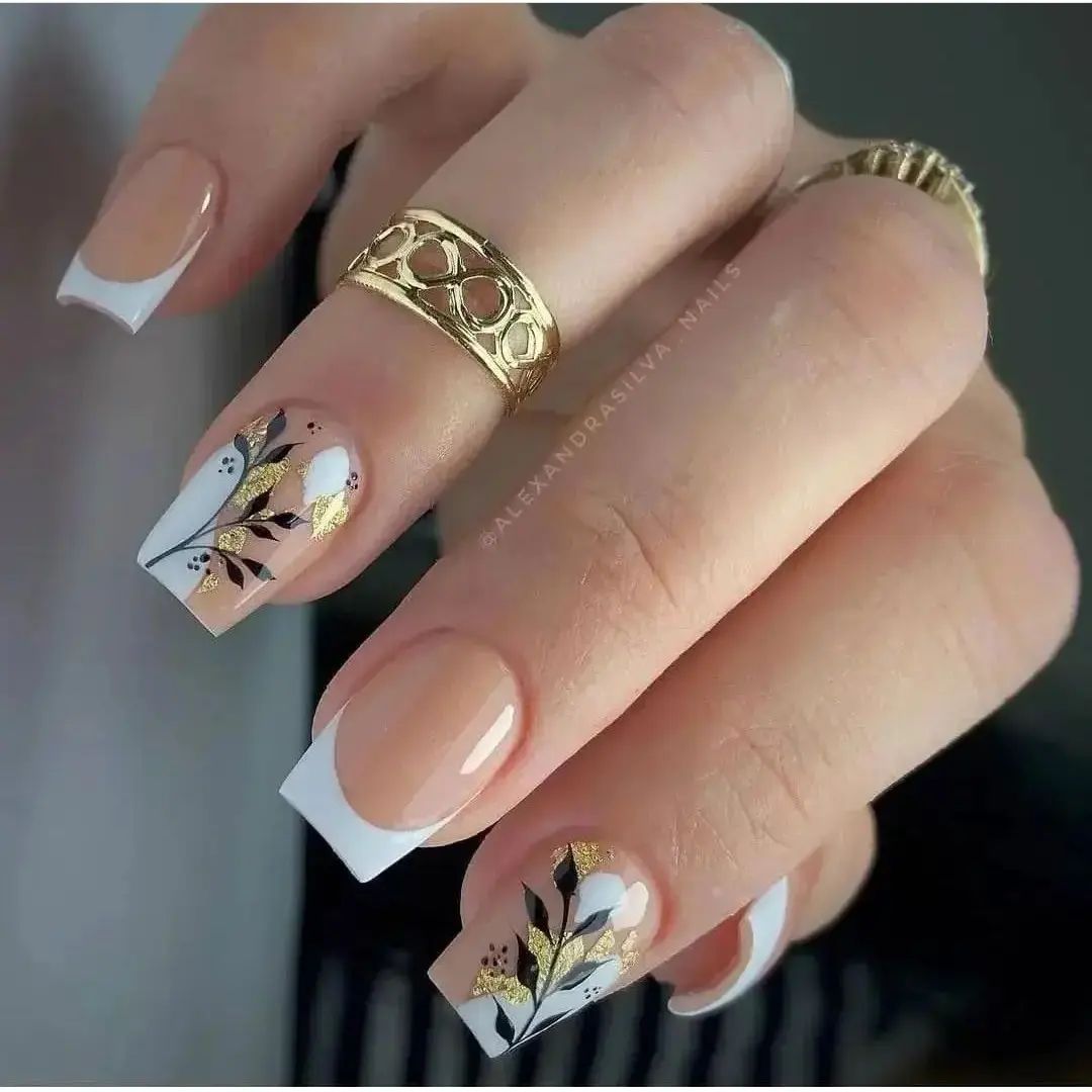 Those who like floral nail designs will enjoy having these on their most beautiful day. While French tips offer a quite chic and classic look, floral accent nails will give a whole different energy to you. Plus, golden glitters are gorgeous.