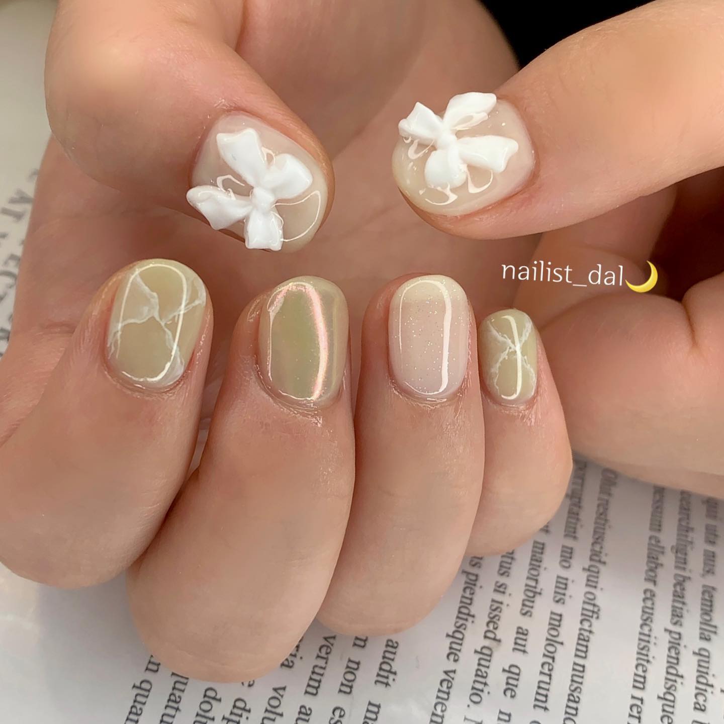 Not all wedding nails should be white, so you can combine nude nail polish with a light green one. Your short nails will look more amazing if you add cute ribbons on your thumbs. They will symbolize your cuteness as a bride.