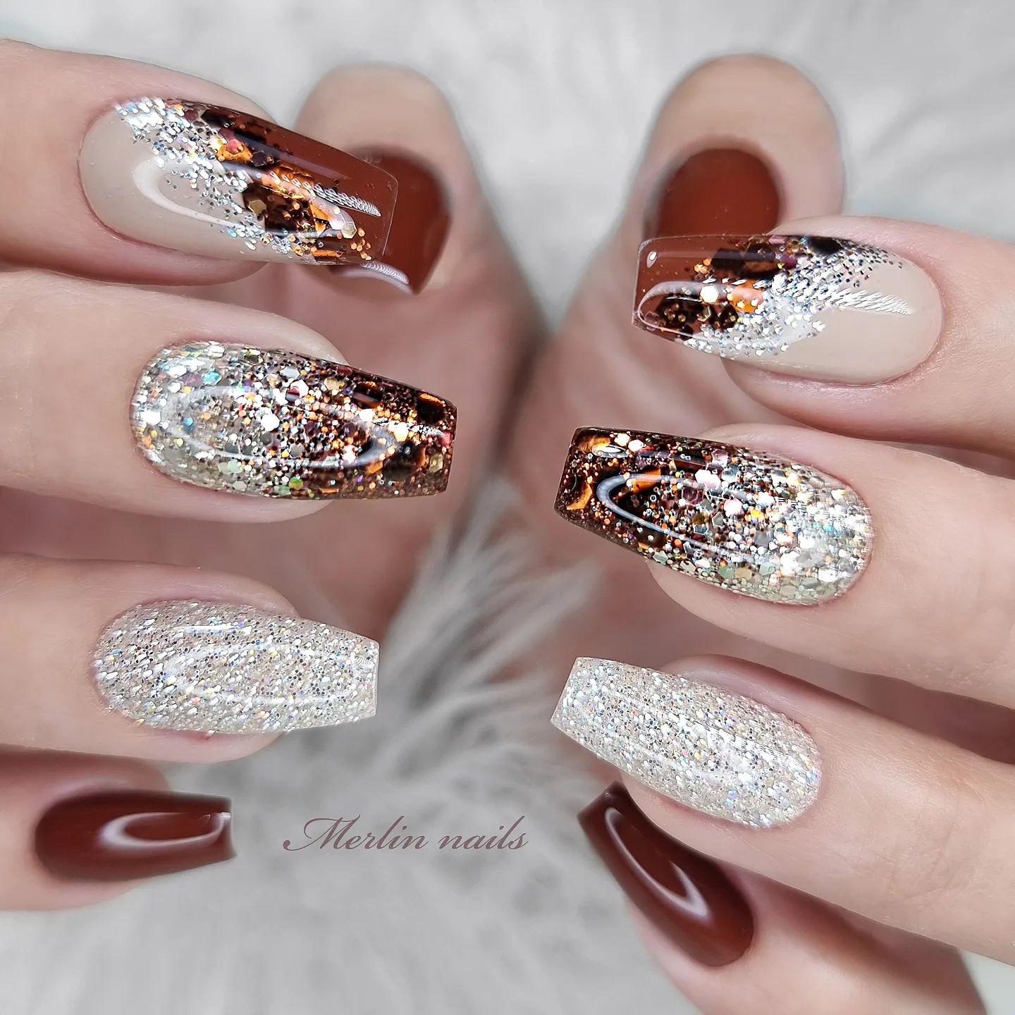 It's so hard to take our eyes off this nail design, right? Sometimes it is boring to have just a simple design, so let's apply different nail designs to each of your nails. Brown ombre with glitters and glitter cover can make you feel like you are a glitter star.